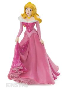 'You'll love me at once, the way you did once upon a dream.' Aurora wears her sparkling pink regal gown. A gorgeous Sleeping Beauty figurine for imaginative play and makes a cute cake topper for your Disney Princess party.